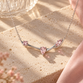 wholleso® Amelie Blush Trio Necklace, hero view showing pink cubic zirconia and blush crystal glass and rhodium-plated 925 sterling silver