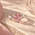 wholleso® Elodie Folded Ribbon Ring, hero view showing dusty-pink cubic zirconia and rhodium-plated 925 sterling silver