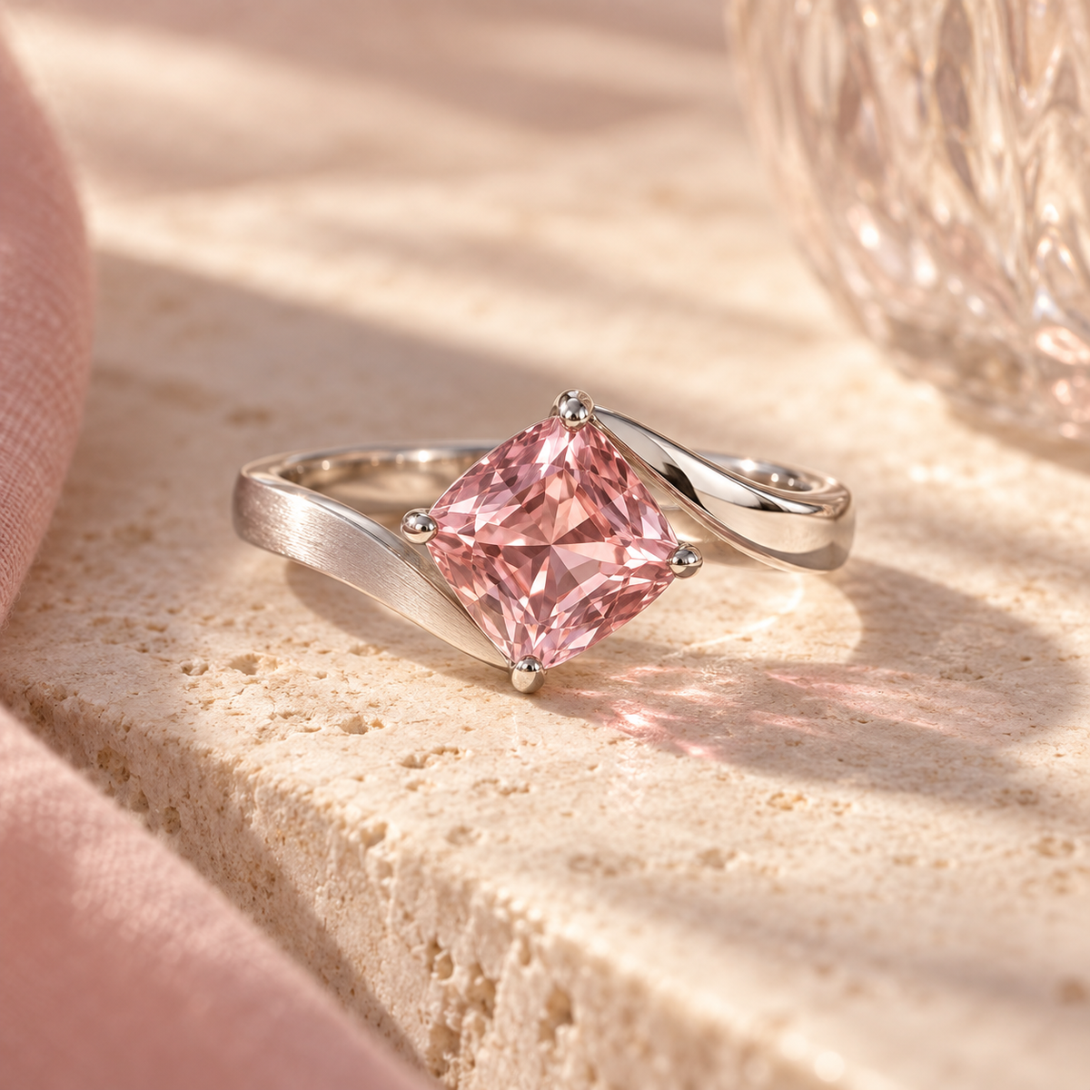 wholleso® Elodie Folded Ribbon Ring, hero view showing dusty-pink cubic zirconia and rhodium-plated 925 sterling silver