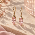 wholleso® Seren Ribbon Drop Earrings, hero view showing pale-pink crystal glass and champagne gold-plated 925 sterling silver